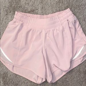 Light pink lululemon size 4 tall shorts